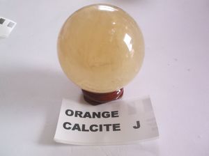 Calcite orange crystal sphere J - NZ Gems