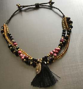 Anklet with beads and tassels