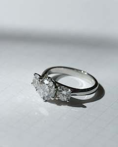 Three Stone: Stelle Round Brilliant Diamond Three Stone Engagement Ring