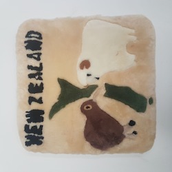 Alpaca Cushions: Auskin Sheepskin Cushion NZ Symbols