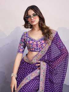 Georgette Collection: Purple Georgette Printed Saree with Embroidered Border – Grace Meets Glamour