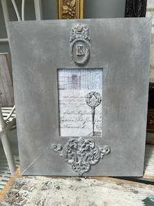 Wooden frame repainted in custom colour with moulds, decorated by PMV