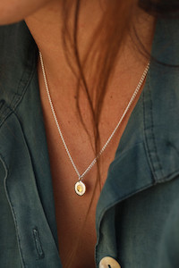 Products: Petite pure silver pendant with 22K gold spot Patina Jewellery