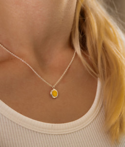Products: Pure Silver rounded disc pendant with 22K Gold Patina Jewellery