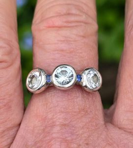 Products: Join the dots ring. sterling silver, pale blue and white topaz, sapphires. Size P 1/2 - Penelope Barnhill Jewellery