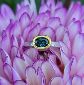 Products: Empress Ring. unheated, ethical teal parti sapphire, peach sapphires, silver and 24ct gold. Size N - Penelope Barnhill Jewellery