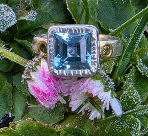 Products: Chloris ring. princes topaz with green sapphire, silver, fine silver and 24ct gold. Size O - Penelope Barnhill Jewellery