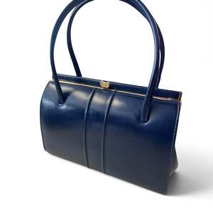Products: BOND STREET NAVY LEATHER BAG