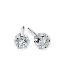 Earrings: .80CT TDW Diamond Studs