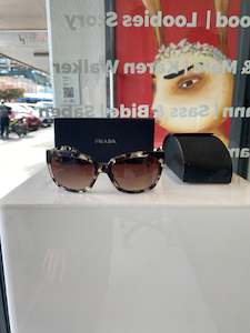 Accessories: Prada, Sunglasses