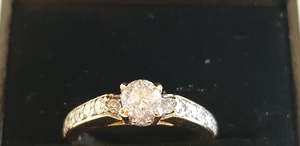 Products: A Soliatire Diamond Ring