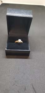 Products: A solitaire Diamond Engagement Ring
