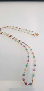 Products: A Handmade Emerald, Sapphire and Ruby Necklace
