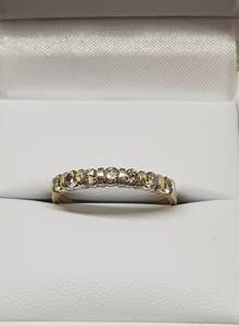 Products: Lady’s Modern Style Seven Diamond Set Ring (Valuation: $1,600.00)