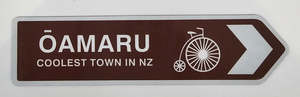 Oamaru - Coolest Town Sign Magnet - Brown with Penny Farthing