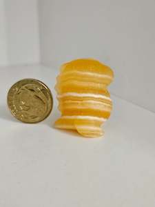 10 Deals: Dinosaur - Banded Yellow Calcite