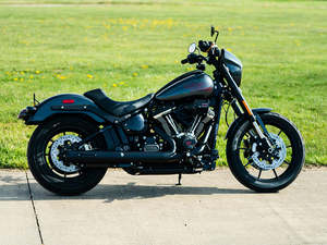 Mufflers Breakout: 4in. HP40 Slip-On Muffler - Black with Black End Cap. Fits Softail Street Bob, Low Rider S, Low Rider ST & Heritage 2025up - Rinehart Exhaust
