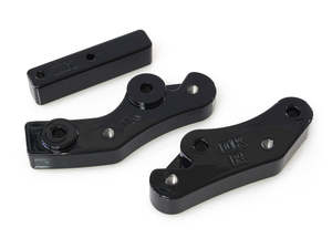 F Board Mnts Adaptors Spares: Front Floorboard Relocation Brackets - Black. Fits FL Softail 2018up. - Custom DK Products