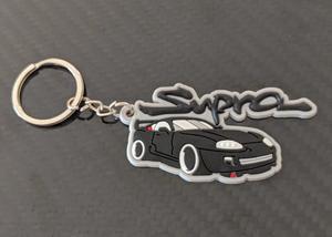 T Shirts And Merch: Supra Keychain - Silicone