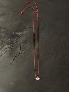 Wilbur Hsu: Silver Conch Shell on Red Silk Necklace