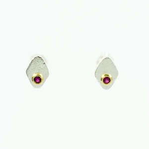 Lucia Araoz: LA30: Silver ear studs gold bezel and AAA ruby