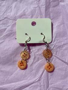 Earrings: Button dangly earrings | Orange