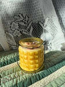 Upcycled glass candle