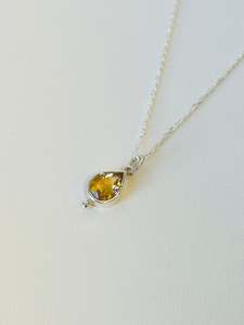 Festive Treats: Topaz and sterling silver pendant