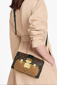 Accessories: LOUIS VUITTON "Monogram Reverse Trunk Clutch"