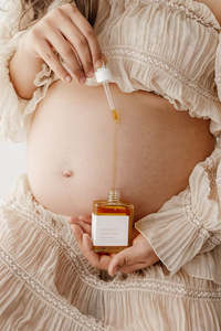 Bathroom Body: Growing Mama Belly Oil | MAMA + ME