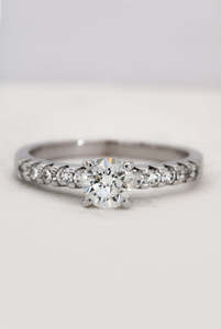 Rings: White Gold Solitaire Ring with Shoulder Diamonds