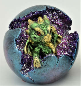 Dragons: Green Baby Dragon in crystal ball