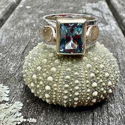 Rings: Sky blue topaz amore ring