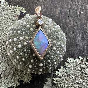Opal: Australian opal & diamond pendant in 9 carat gold