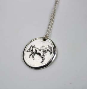 Western Edge - The Bronc Medallion