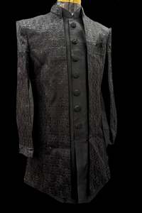 Indo Western: (Video clip attached)Black Raw silk based heavy embroidery work with all over sequinned work Jacket style Mens classy Indo western with (half sleeves Kurta ) and Pants