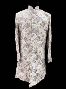 Indo Western: (Video clip attached )Cream gold beige based heavy embroidery & pearl sequined work all over with hand work pearl beaded neck, buttons and sleeves design Sherwani and Pants