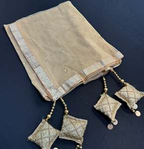 Golden color Netting based stone work design with cushioned tessels & lace work dupatta