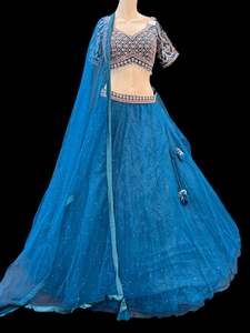 Crop Top: (Video clip attach)size 38(upto 40) fully stitched Peacock Blue color full of embroidery, stones and Mirror work blouse and all over heavy multi flared party wear lehnga dupatta