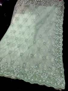 (Video Clip attached )Mint color designer Saree with netting base fabric and sto&hellip;