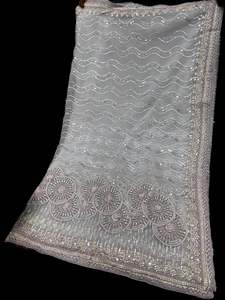 Heavy Work Sarees 1: (Video Clip attached )Heavy work designer Saree with netting base fabric and stones work design all over with heavy embroidery work