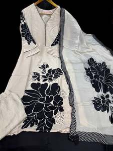 Stitched Punjabi Suits: (Video Clip attached )Ivory color floral print work with hand work all over design very soft crepe Silk based beautiful kameez & Plazo pants with beautiful Dola silk Dupatta with floral print work