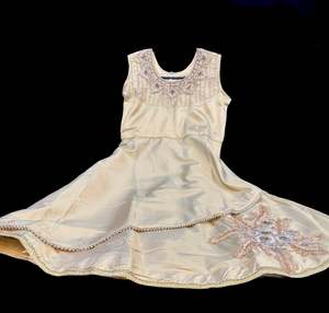 Girls Frocks: Golden colour silk based beautiful kids gown