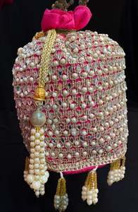 Pearls and mirrors beaded with stones work hand bag /potli bag