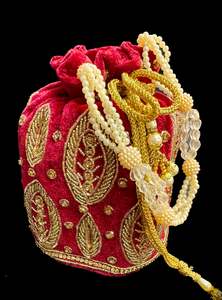 Clutch Bag And Potli Bag: Velvet based pearls with stones work hand bag /potli bag