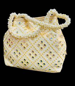 Pearls with stones work hand bag /potli bag