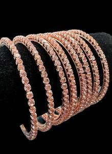 Metal Bangles: Rose gold Crystal stones bangles set (price per set) per set 8 bangles ) perfect to match with plain velvet/metal bangles