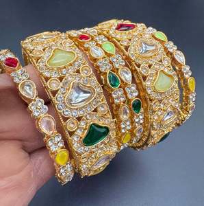 Bangles Set: Kundan and multicolored stones work gold color bangles set (price per pack)