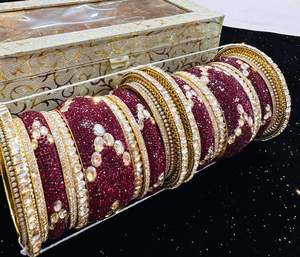 Brass Bangles: Beautiful Maroon stones with jerkin beaded and Crystal stone Designer Bridal Churra (Video clip attached )