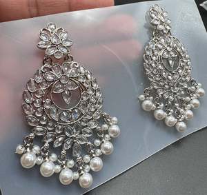 Earrings: Polki stone beautiful earrings with pearls hanging